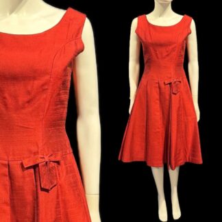 Adorable late 1950's cocktail dress by Carnegie
